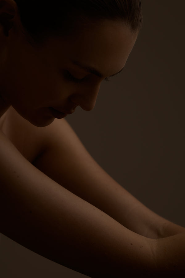 Silhouette of a person with a blurred background