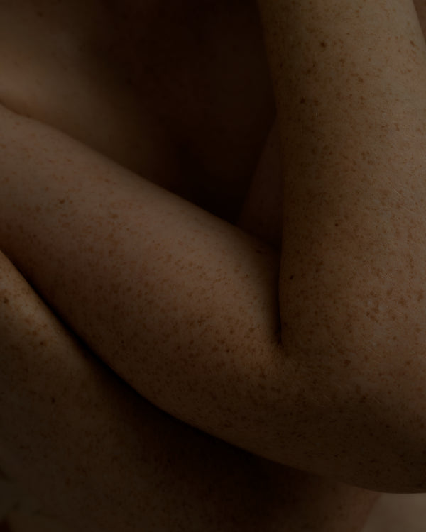 Close-up of a person's arm with visible skin texture